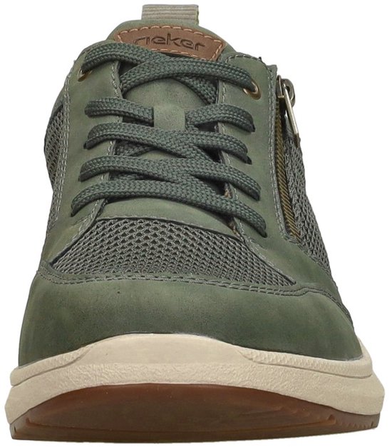 Vooraanzicht van een groene sneaker met veters en rits.