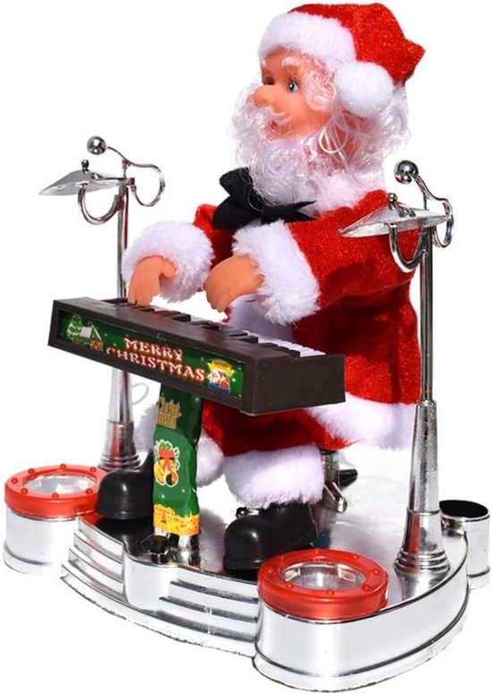 Père Noël jouant du clavier avec le texte "Merry Christmas" et décorations de Noël, sur une scène argentée avec des haut-parleurs rouges.