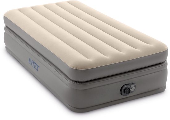 Grijs Intex luchtbed met beige, ribbelige bovenkant en zijaansluiting voor pomp.
