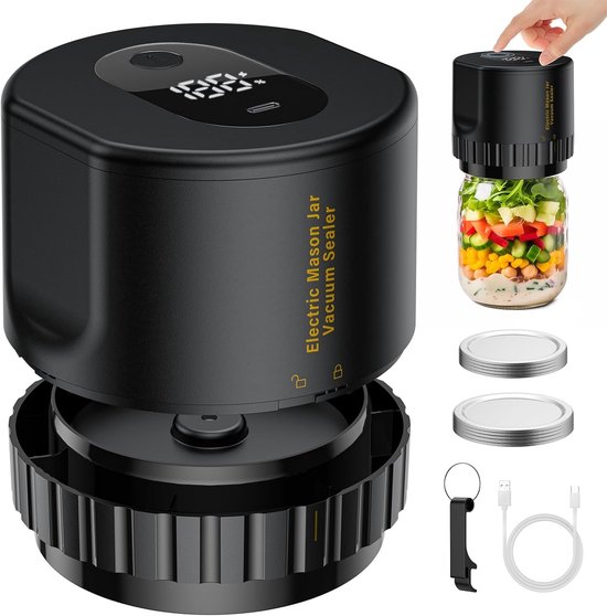 Machine de scellage sous vide électrique noire avec base, écran d'affichage, câble USB et couvercles. Pot avec des légumes.