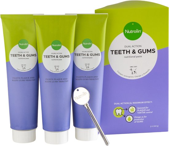 Drie paarse tubes tandpasta met groene doppen en een doosje. Eén zilveren sleutel ligt naast de tubes.