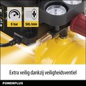 Close-up van de gele Powerplus compressor. Drukmeters en aansluitingen zichtbaar.