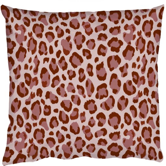 Coussin avec imprimé léopard rose et taches brunes.