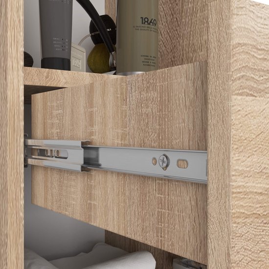 Houten badkamermeubel met uitgeschoven lade met metalen geleiders.