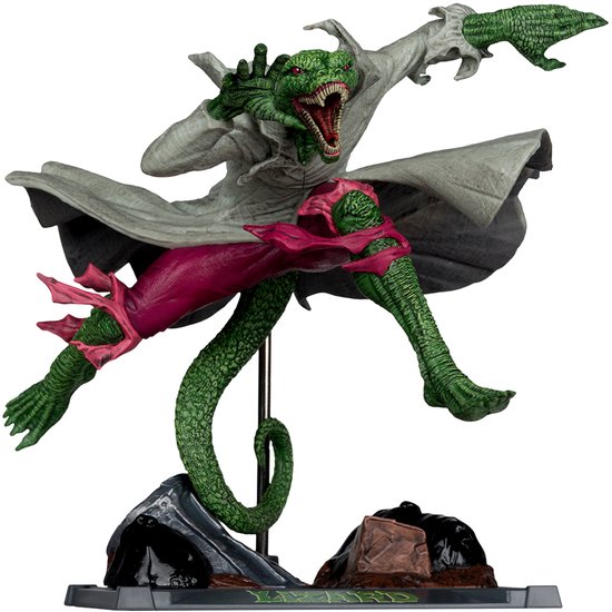 Figurine du Lézard avec écailles vertes, manteau blanc, pantalon rose, queue, rictus agressif, sur base rocheuse.
