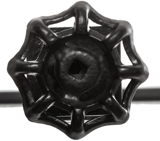 Gedetailleerde close-up van een zwarte, stervormige metalen draaiknop voor tafelbevestiging.