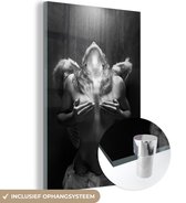 MuchoWow® Glasschilderij 100x150 cm - Schilderij acrylglas - Vrouw - Engel - Veren - Portret - Zwart wit - Foto op glas - Schilderijen