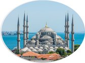 PVC Schuimplaat Ovaal - Sultan Ahmet Moskee aan de Zee van Turkije - 28x21 cm Foto op Ovaal (Met Ophangsysteem)