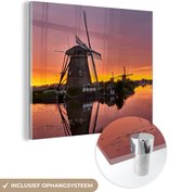 MuchoWow® Glasschilderij 20x20 cm - Schilderij acrylglas - Molen - Zonsondergang - Wieken - Foto op glas - Schilderijen
