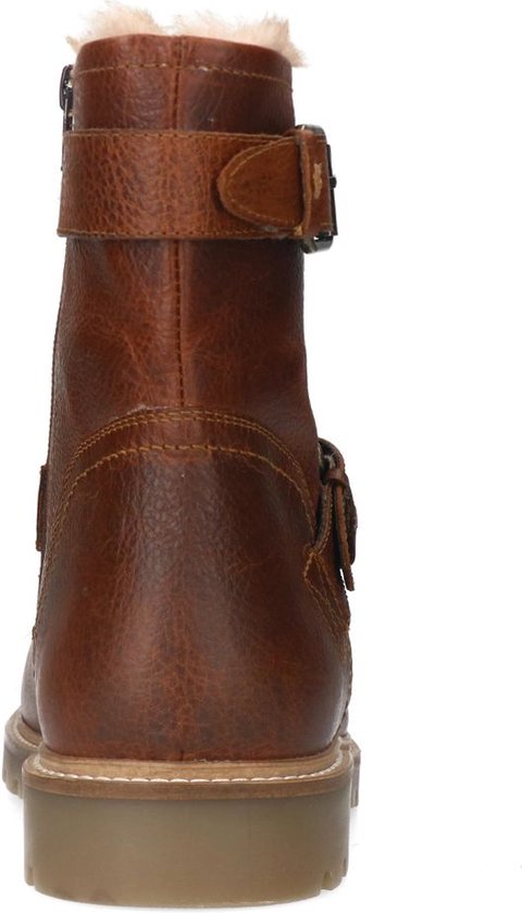 Arrière d'une botte style motard en cuir marron avec boucles et doublure en fourrure.