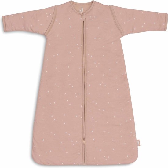 Roze slaapzak met mouwen, witte stipjes en een ritssluiting.