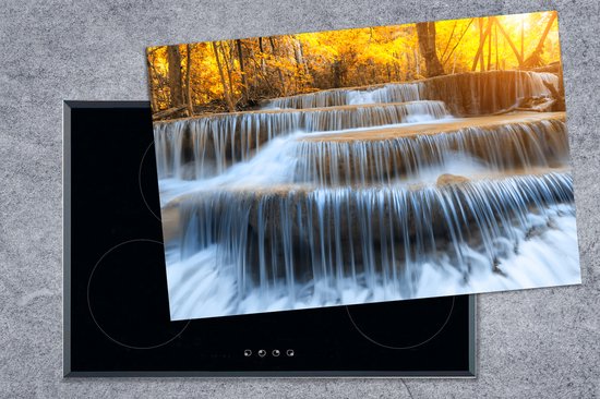 KitchenYeah® Inductie beschermer 77x51 cm - Waterval - Natuur - Bomen - Herfst - Landschap - Kookplaataccessoires - Afdekplaat voor kookplaat - Inductiebeschermer - Inductiemat - Inductieplaat mat