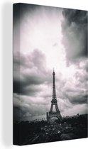 Canvas Schilderij Eiffeltoren onder woeste wolken - 40x60 cm - Wanddecoratie
