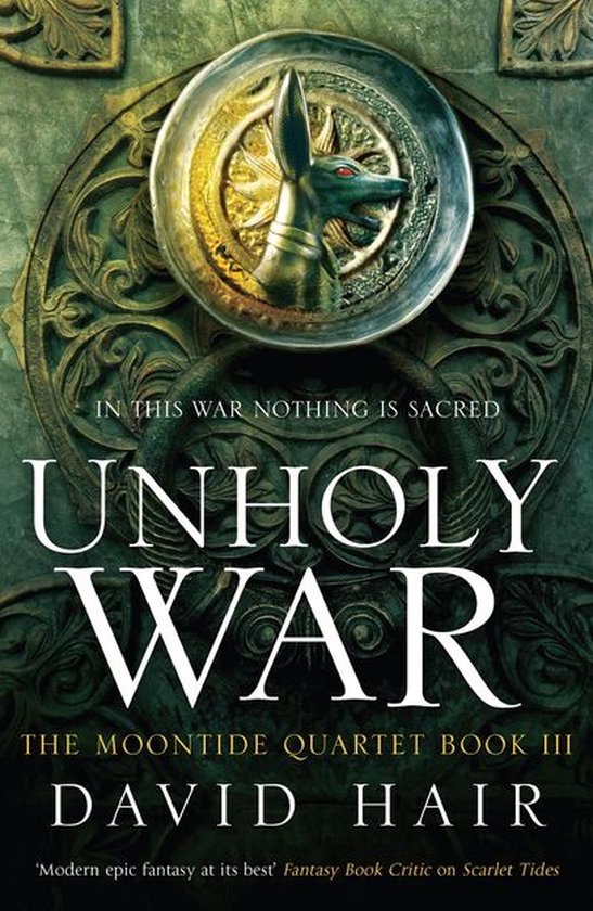 Boekomslag van 'Unholy War' door David Hair met een gouden anubis-kop, 'In this war nothing is sacred' en 'Unholy War'.