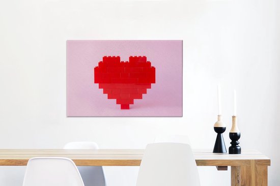 Coeur rouge formé par du papier d'affiche lego