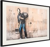 Ingelijste Poster - Banksy: Zoon van een migrant uit Syrië  Zwarte lijst met passe-partout
