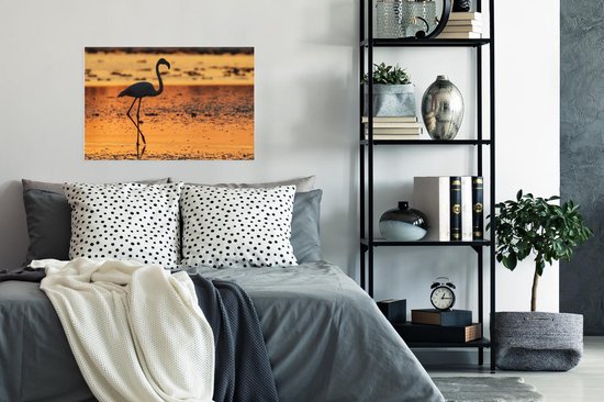 Poster Het silhouet van een flamingo bij zonsondergang - 60x40 cm