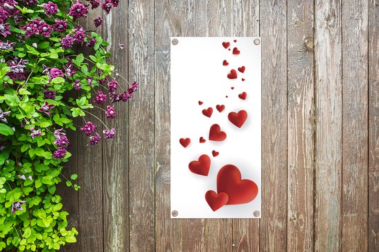 Tuinposter Een illustratie van een pad van hartjes - 40x80 cm - Wanddecoratie Buiten - Tuinposter - Tuindoek - Schuttingposter - Tuinschilderij