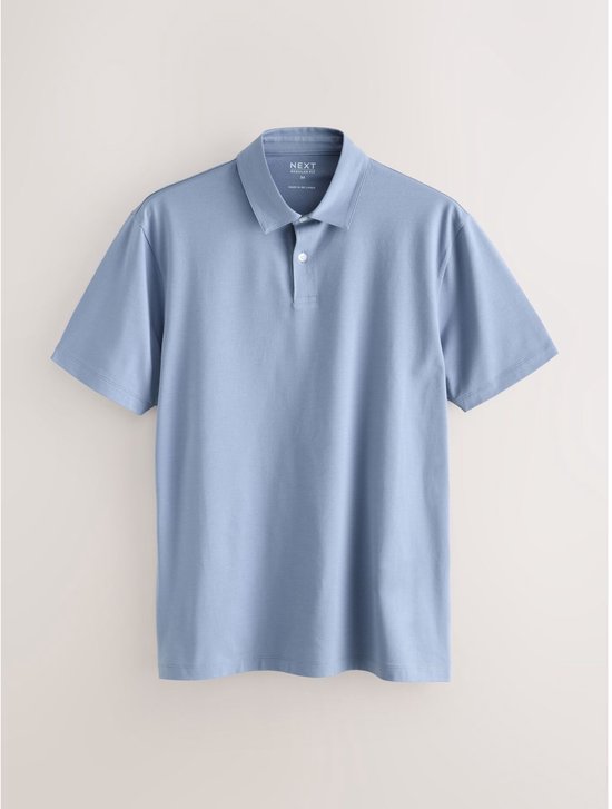 Een lichtblauwe poloshirt met korte mouwen en een knoopsluiting. Het shirt heeft een standaard pasvorm en is gemaakt van jersey.