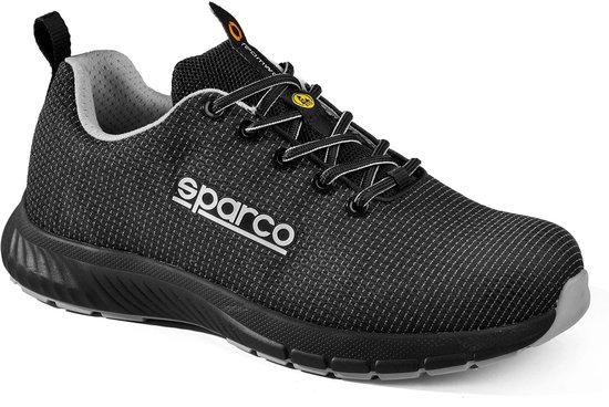 Chaussure de travail Sparco noire avec inscription argentée 'sparco', maille grise/noire et semelle grise.
