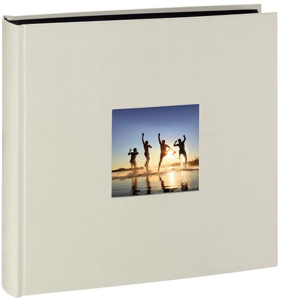 Crèmekleurig fotoalbum met een vierkante foto van vier springende kinderen bij zonsondergang op het strand.