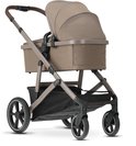 Bruine Deryan kinderwagen met reiswieg en kap, op de grond.