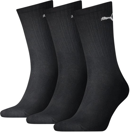 Drie zwarte sokken met ribbels en Puma-logo op de kuit.