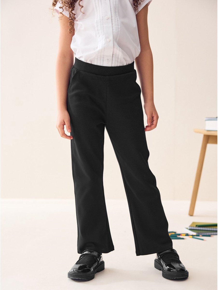 Next - Meisjes - Schoolbroek met hoog aandeel katoen, stretch, uitlopende pijpen en elastische tailleband - Zwart