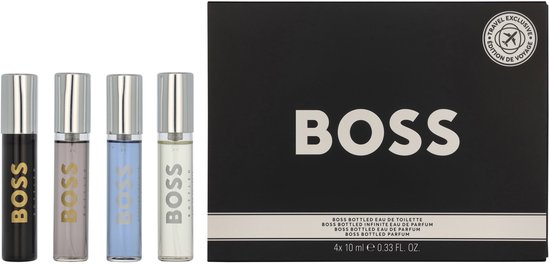 Vier BOSS Bottled mini-parfumflesjes: zwart, lichtgrijs, lichtblauw en crème, met een zwarte geschenkdoos.