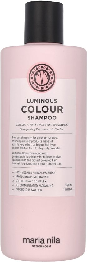 Luminous Colour Shampoo in een roze fles met label en zwarte dop. Het label vermeldt 'Luminous Colour Shampoo', 'Maria Nila STOCKHOLM'.