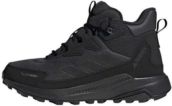 Chaussure de randonnée Terrex noire avec logo adidas gris, lacets et inscription 'CLIMAWARM' sur le côté.