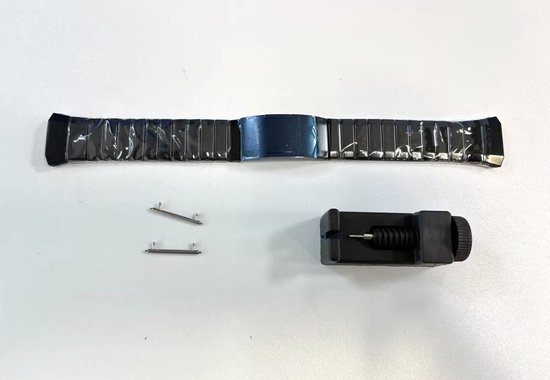 Horlogeonderdelen: een zwart metalen horlogeband, twee pinnen en een horlogebandvervangingsgereedschap.
