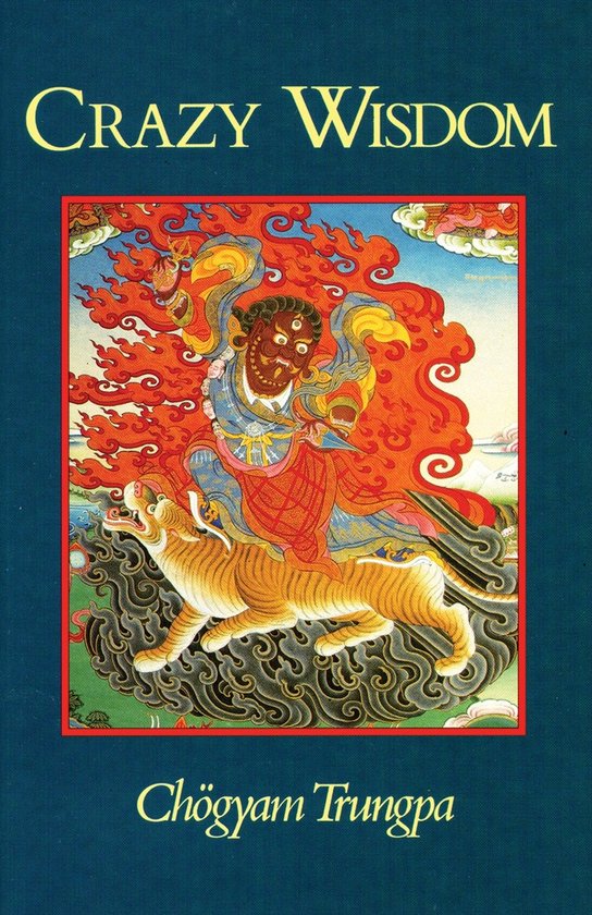 Boek 'Crazy Wisdom' door Chögyam Trungpa, met een tibetaanse illustratie van een figuur op een tijger.