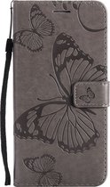 Mobigear Telefoonhoesje geschikt voor Realme 8 Hoesje | Mobigear Butterfly Bookcase Portemonnee | Pasjeshouder voor 2 Pasjes | Telefoonhoesje voor Pinpas / OV Kaart / Rijbewijs - Grijs