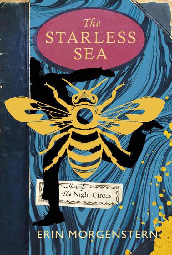 Livre "The Starless Sea" avec une grande abeille jaune et une silhouette d'homme sur un fond bleu marbré noir.