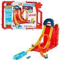Kit de cascades Hot Wheels Track Builder en forme de bidon d'essence avec circuit orange, loopings et une petite voiture.