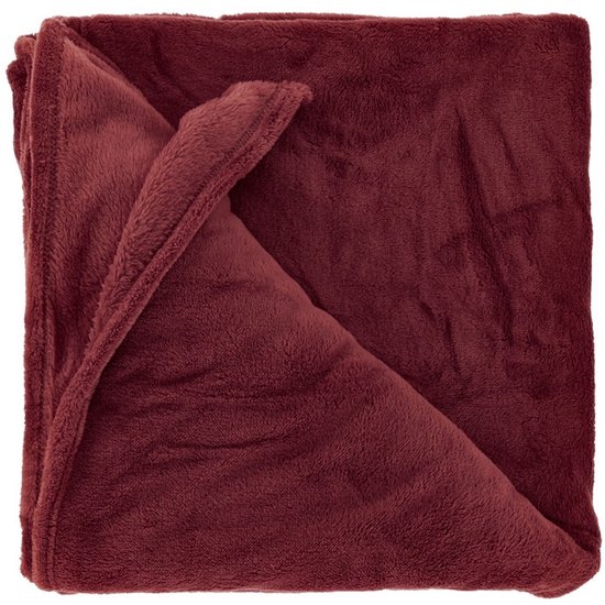 Zachte, donkerrode plaid van fleece met een warme, fluweelachtige uitstraling.