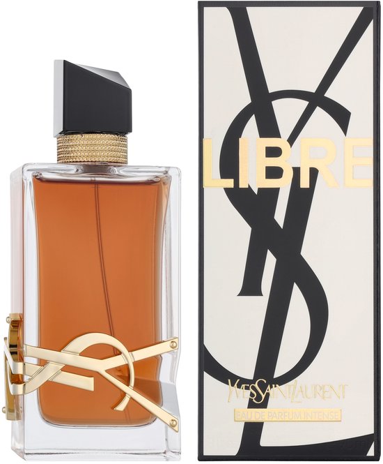 Yves Saint Laurent Libre Intense eau de parfum, amberkleurige vloeistof in glazen fles met goudkleurige YSL-logo en zwarte dop. Naast de fles staat de kartonnen verpakking met 'LIBRE' in goudkleurige letters.