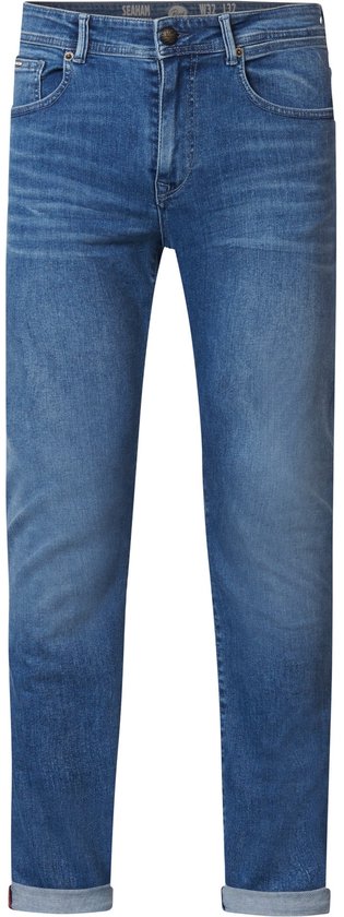 Blauwe slim fit jeans met subtiele wassing, knoopsluiting en omgeslagen broekspijpen.