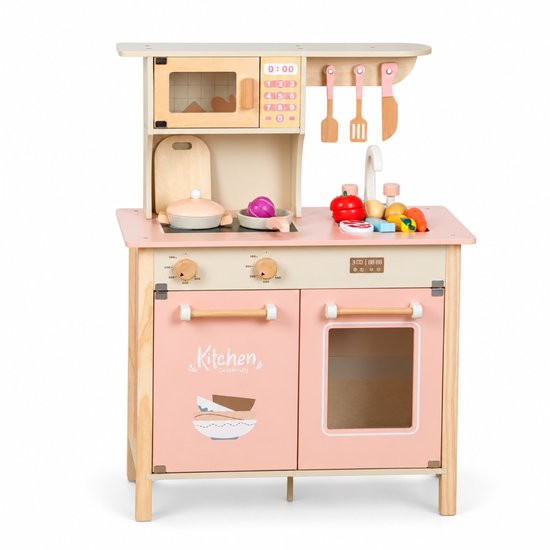 Pastelroze houten speelkeuken met oven, magnetron, kookplaat en bijbehorende accessoires.