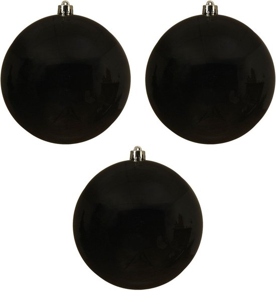Trois grandes boules de Noël noires brillantes en plastique avec des capuchons argentés.