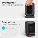 Zwarte draagbare verwarming, eenvoudig te verplaatsen. Direct warme lucht binnen 2 seconden.