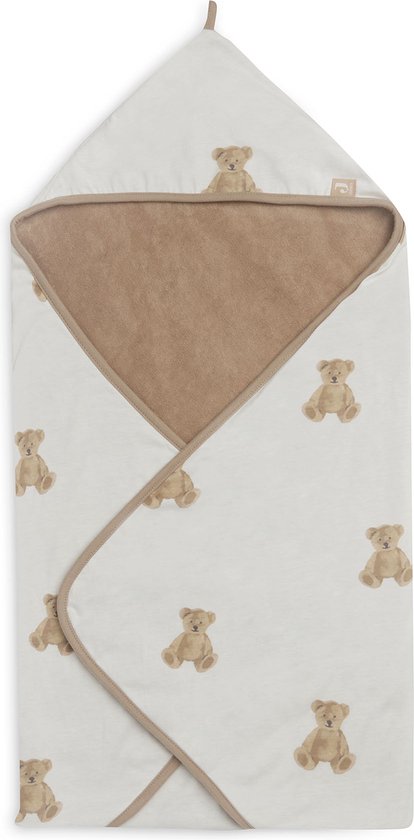 Cape de bain blanc cassé avec imprimé ours en peluche marron et bordure beige. La cape est pliée et montre un ours en peluche sur la capuche.