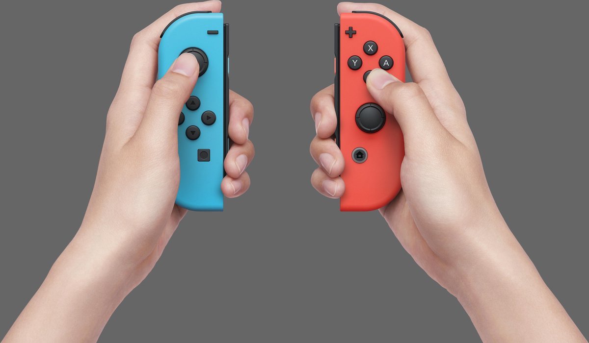 Nintendo Switch OLED - Blauw/Rood – foto 6