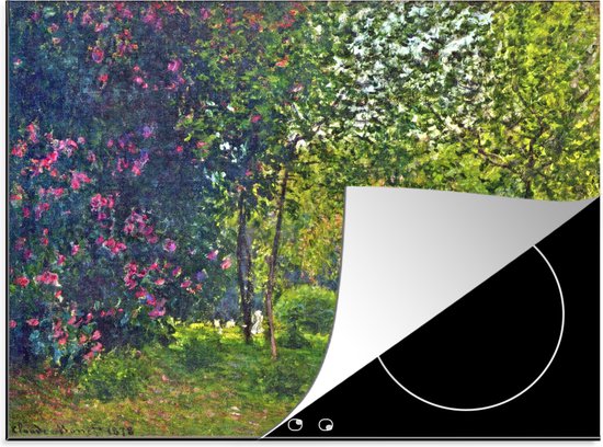Inductie beschermer met Parc Monceau schilderij, gedeeltelijk opgerold toont zwarte antislip achterkant.