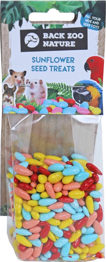Een verpakking met Back Zoo Nature Sunflower Seed Treats, met afbeeldingen van hamsters en parkieten op de kaart. De zak bevat veelkleurige, ovale snoepjes in geel, rood, lichtblauw en roze.