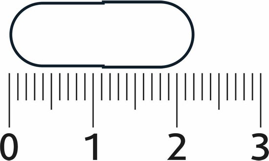 Een capsule van ongeveer 1,5 cm lang, naast een liniaal van 0 tot 3.