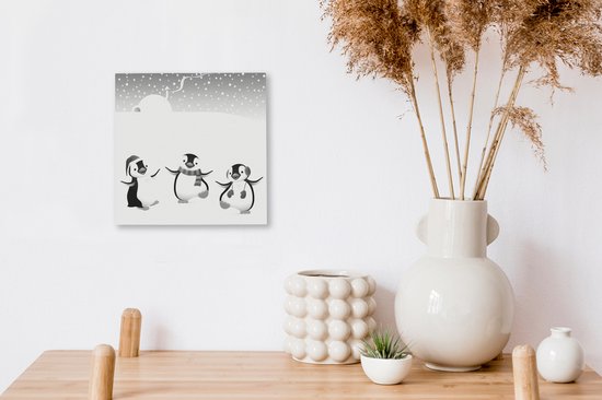 Tableau sur toile Une illustration de trois pingouins dans la neige - noir et blanc - 20x20 cm - Décoration murale
