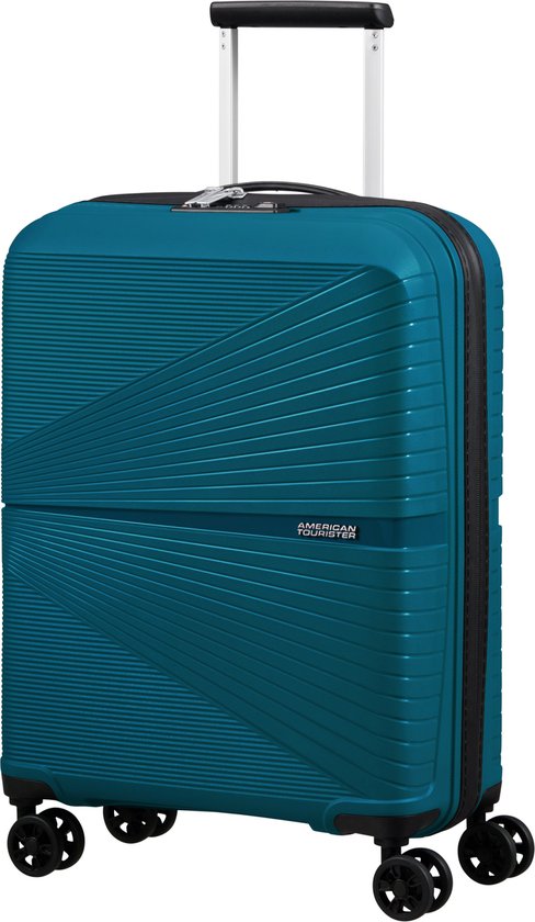 Blauwe American Tourister koffer met gestreept patroon, trolleysysteem en vier wielen.