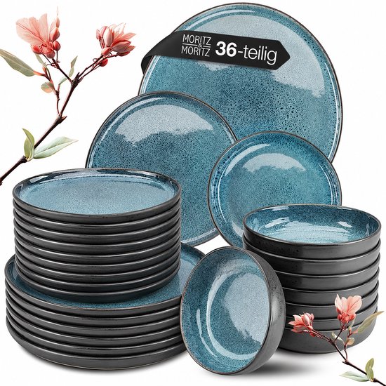 Moritz & Moritz 36-delige serviesset. Borden en kommen in donkerblauw met gespikkeld design en zwarte rand.